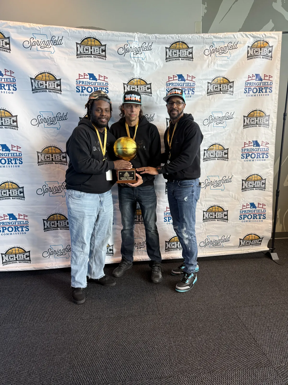 Warriors coaching staff with the NCHBC Gold Ball trophy